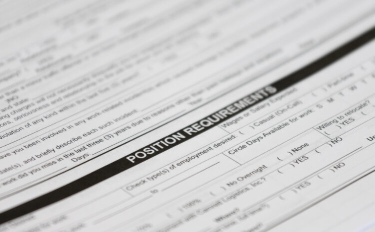 featured image showing Closeup of a job application with the words Position Requirements as the focal point.
