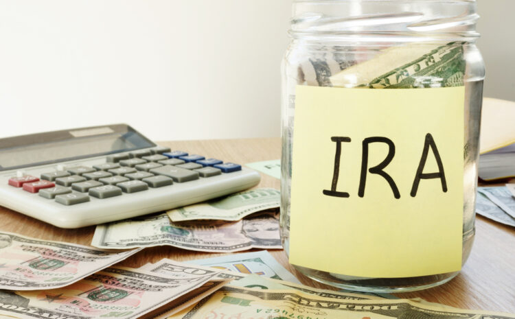 Featured image showing IRA written on a stick and jar with dollars.